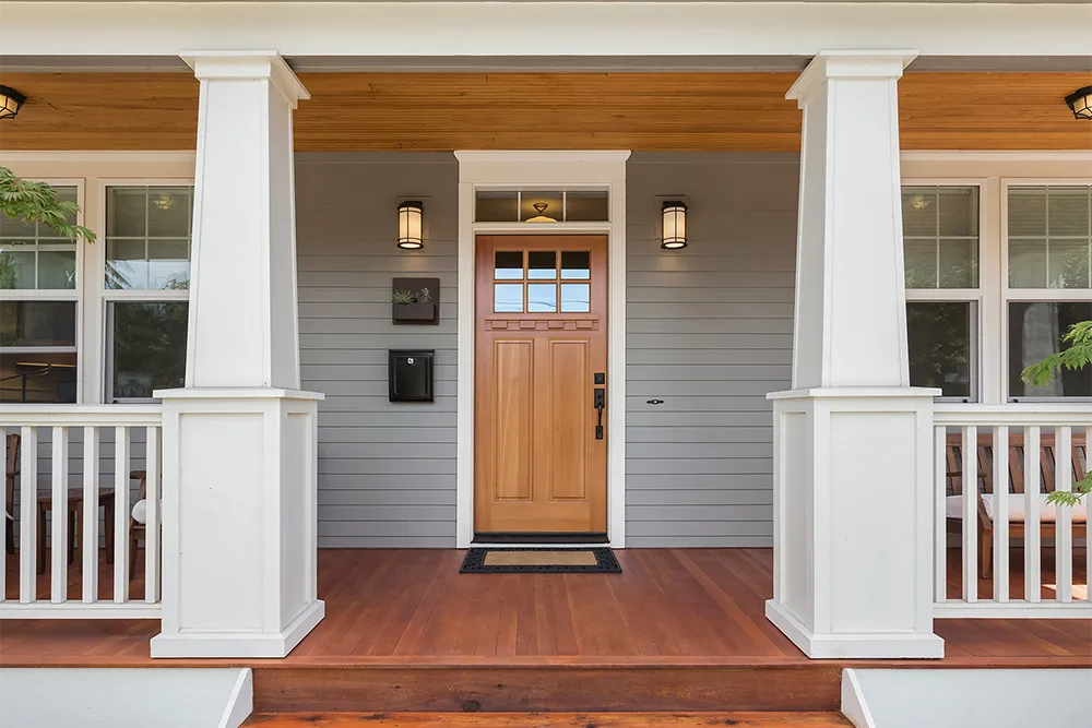 wooden front door of modern home